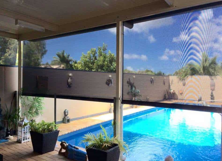 A covered patio area adjacent to a swimming pool (Queensland Summer)